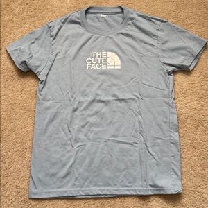 Light Blue Graphic T-Shirt - Size Medium
